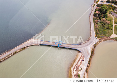 Aerial view of a small drawbridge. Antenal, Istria, Croatia. 130035248