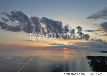Sunset clouds over the Adriatic coast. Istria, Croatia. Sunset clouds over the Adriatic coast. Istria, Croatia. 130035253