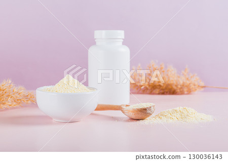 Hydrolyzed collagen protein powder in bowl on table 130036143