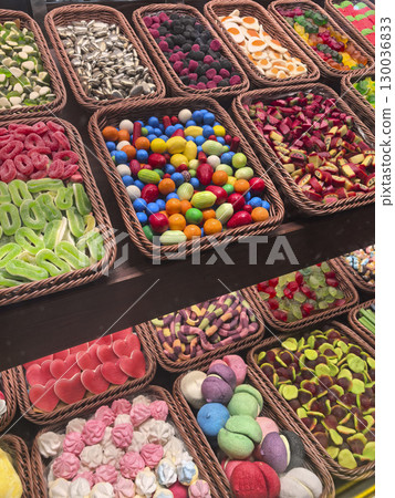 Colorful array of candies displayed at a vibrant market in the afternoon 130036833