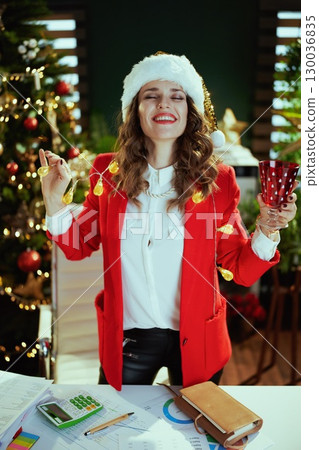smiling stylish small business owner woman dancing smiling stylish small business owner woman dancing 130036835