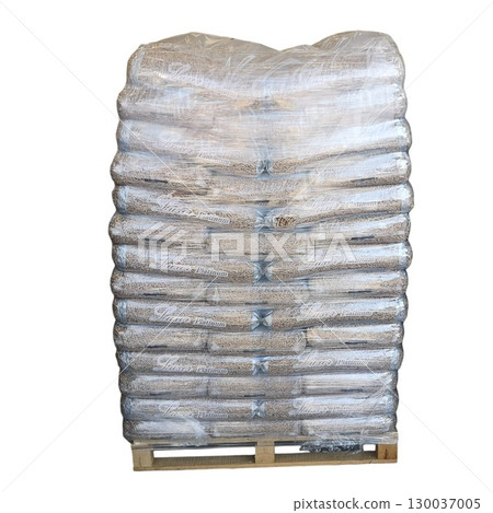 Stacked compressed wood shavings bags on pallet, ready for delivery Stacked compressed wood shavings bags on pallet, ready for delivery 130037005