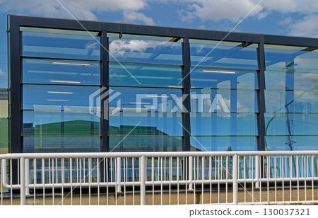 Closed glass wall house outside 130037321