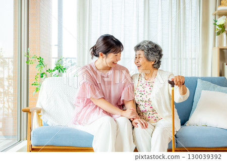 Grandma and granddaughter 130039392