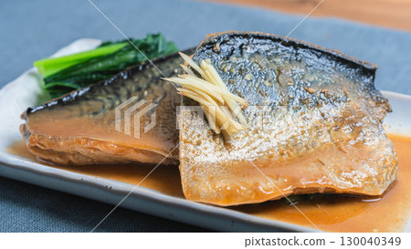 Mackerel simmered in miso with a side of green vegetables, a classic Japanese fish dish 130040349