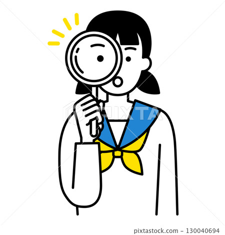 Female student looking through a magnifying glass 130040694