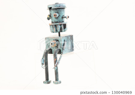 Wooden robot toy on isolated background Wooden robot toy on isolated background 130040969