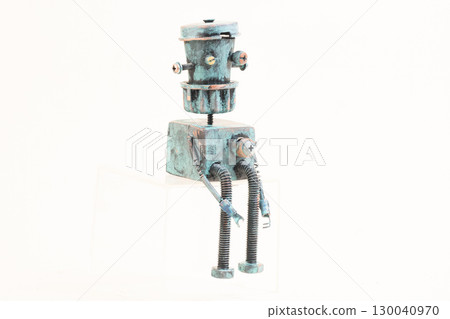 Wooden robot toy on isolated background 130040970