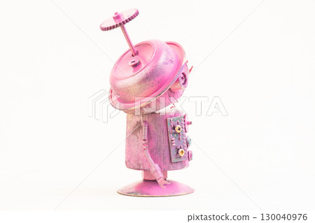 Wooden robot toy on isolated background 130040976