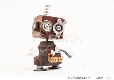 Wooden robot toy on isolated background Wooden robot toy on isolated background 130040979