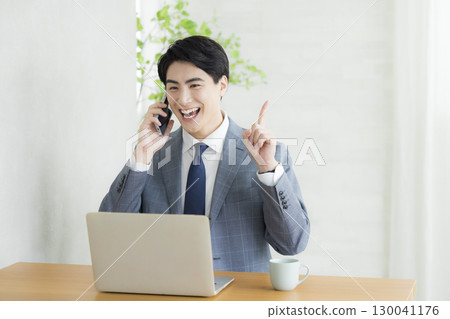 smiling businessman smiling businessman 130041176