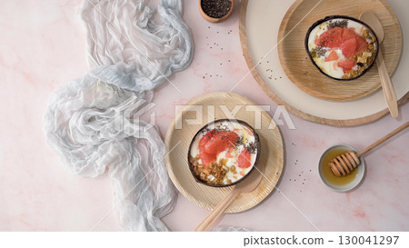 Yogurt with grapefruit, granola, chia and honey 130041297