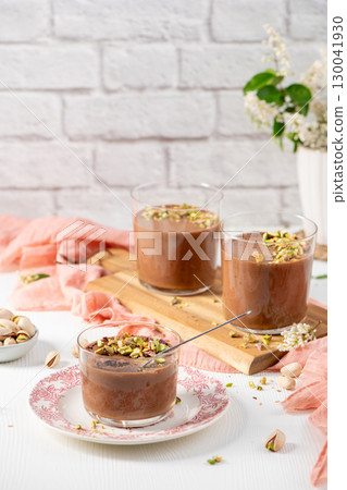 Three glasses of rich chocolate pudding 130041930