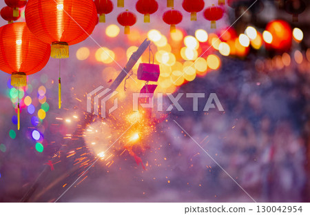 Traditional Chinese firecrackers are exploding with flashes and smoke in Lunar new year. Traditional Chinese firecrackers are exploding with flashes and smoke in Lunar new year. 130042954