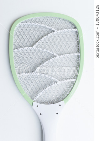green mosquito swatter isolated on white background green mosquito swatter isolated on white background 130043128