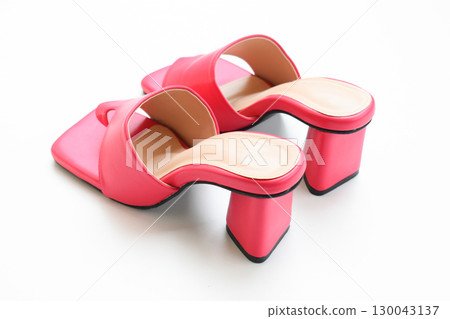 beautiful pink leather heel shoe isolated on white background beautiful pink leather heel shoe isolated on white background 130043137