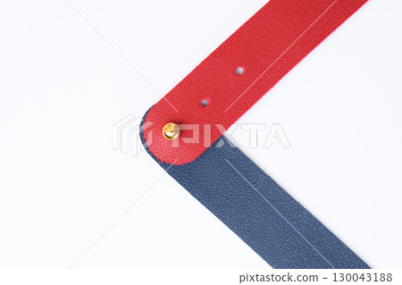dark blue and red leather strap isolated on white background dark blue and red leather strap isolated on white background 130043188