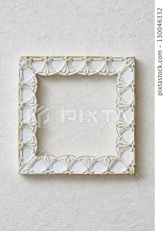 Square frame hanging on a white wall 130046332