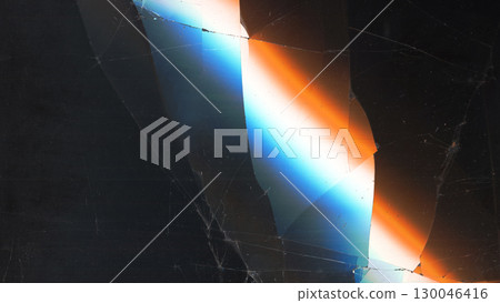 Cracked screen. Glitch glow flare. Fiction damaged scratch defocused black background copy space. Distressed display gradient light distortion. 130046416