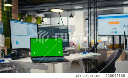 Empty office environment showcases modern tools of chroma key and resources essential for business planning, performance analysis and the development of insights for innovation. 130047186