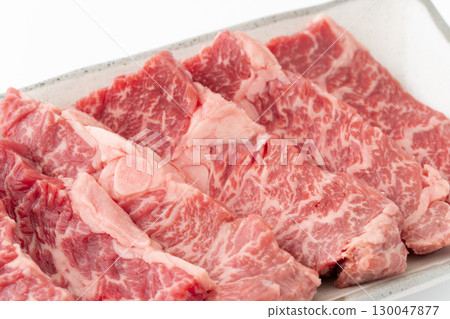 Close-up of beef skirt steak for grilling on a plate Close-up of beef skirt steak for grilling on a plate 130047877