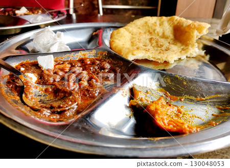 Chole bhature is a North Indian famous food dish. 130048053