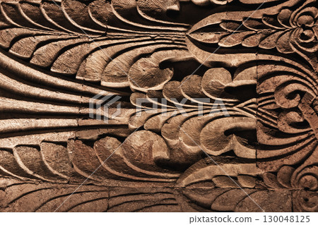 An artistic intricate stone carvings, featuring abstract floral patterns An artistic intricate stone carvings, featuring abstract floral patterns 130048125