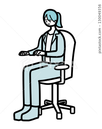 Female office worker sitting in a chair and working Female office worker sitting in a chair and working 130049356
