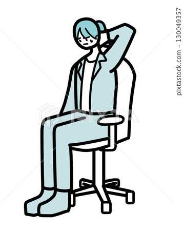 A female office worker touching her neck while sitting in a chair A female office worker touching her neck while sitting in a chair 130049357