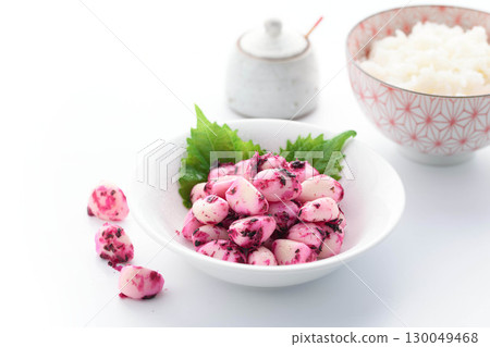 A Japanese food image of shiso, bonito, garlic, and white rice against a white background. Food photo perfect as a side dish or snack with rice. A Japanese food image of shiso, bonito, garlic, and white rice against a white background. Food photo perfect as a side dish or snack with rice. 130049468