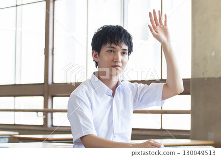 Male student holding hands Male student holding hands 130049513