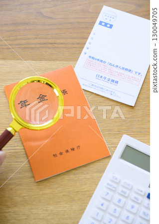 Pension book and pension newsletter (plus magnifying glass) 130049705