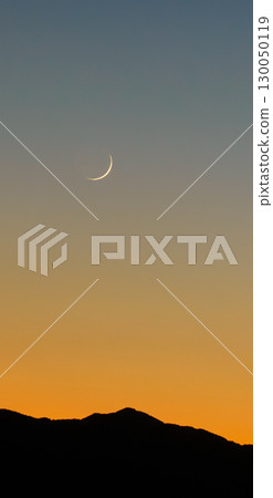 Crescent moon, sunset sky and mountain silhouette Crescent moon, sunset sky and mountain silhouette 130050119