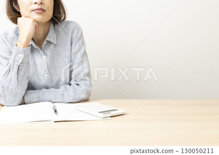 Thinking woman white background Thinking woman white background 130050211