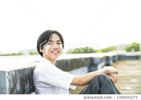 Portrait of a high school boy smiling Portrait of a high school boy smiling 130050273