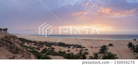 Landscape of Chaves beach resort desert dunes and Atlantic ocean at sunset 130050278