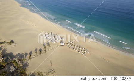 High angle of view of a Chaves beach luxury resort and turquoise ocean 130050279