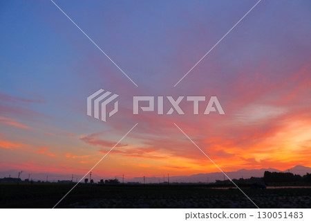 Sunset sky, cultivated land Sunset sky, cultivated land 130051483
