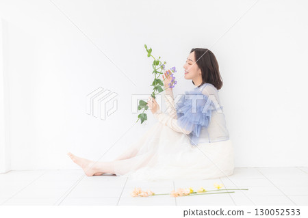 Woman with a bouquet Woman with a bouquet 130052533