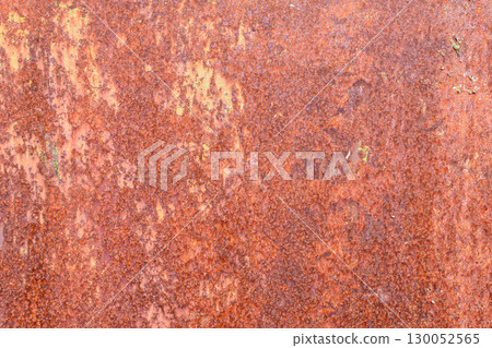 Red-brown texture of metal sheet.Completely rusted sheet metal.Metal corrosion.Rust texture close up. Red-brown texture of metal sheet.Completely rusted sheet metal.Metal corrosion.Rust texture close up. 130052565