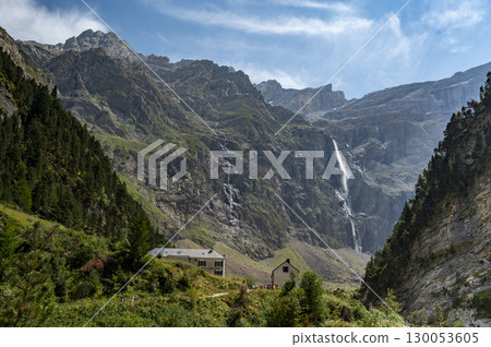 Exploring the majestic Cirque de Gavarnie in the Cauteret Pyrenees with stunning waterfalls and Exploring the majestic Cirque de Gavarnie in the Cauteret Pyrenees with stunning waterfalls and 130053605