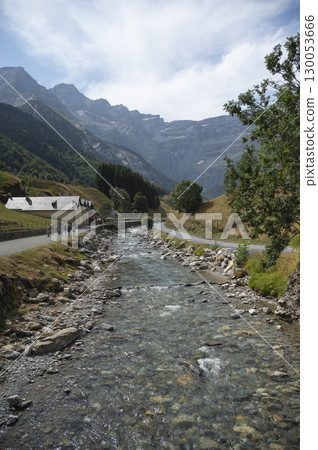 Exploring the picturesque hiking trails in Cirque de Gavarnie while enjoying the stunning scenery of Exploring the picturesque hiking trails in Cirque de Gavarnie while enjoying the stunning scenery of 130053666