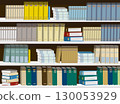 A cluttered bookshelf (blue) 130053929