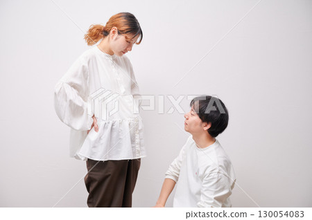 Couple facing each other, pregnant woman, maternity Couple facing each other, pregnant woman, maternity 130054083