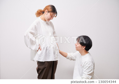 Couple facing each other, pregnant woman, maternity Couple facing each other, pregnant woman, maternity 130054344