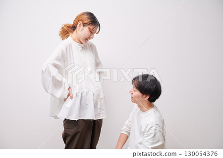 Couple facing each other, pregnant woman, maternity Couple facing each other, pregnant woman, maternity 130054376
