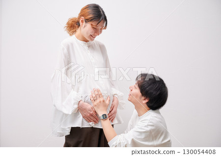 Couple facing each other, pregnant woman, maternity Couple facing each other, pregnant woman, maternity 130054408