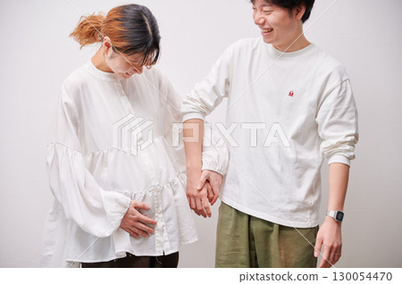 Couple facing each other, pregnant woman, maternity Couple facing each other, pregnant woman, maternity 130054470