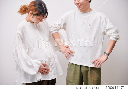 Couple facing each other, pregnant woman, maternity Couple facing each other, pregnant woman, maternity 130054471