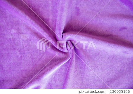 Lilac knitted texture fabric. Purple textile cloth background. Soft material for fashion clothes. Lilac knitted texture fabric. Purple textile cloth background. Soft material for fashion clothes. 130055166